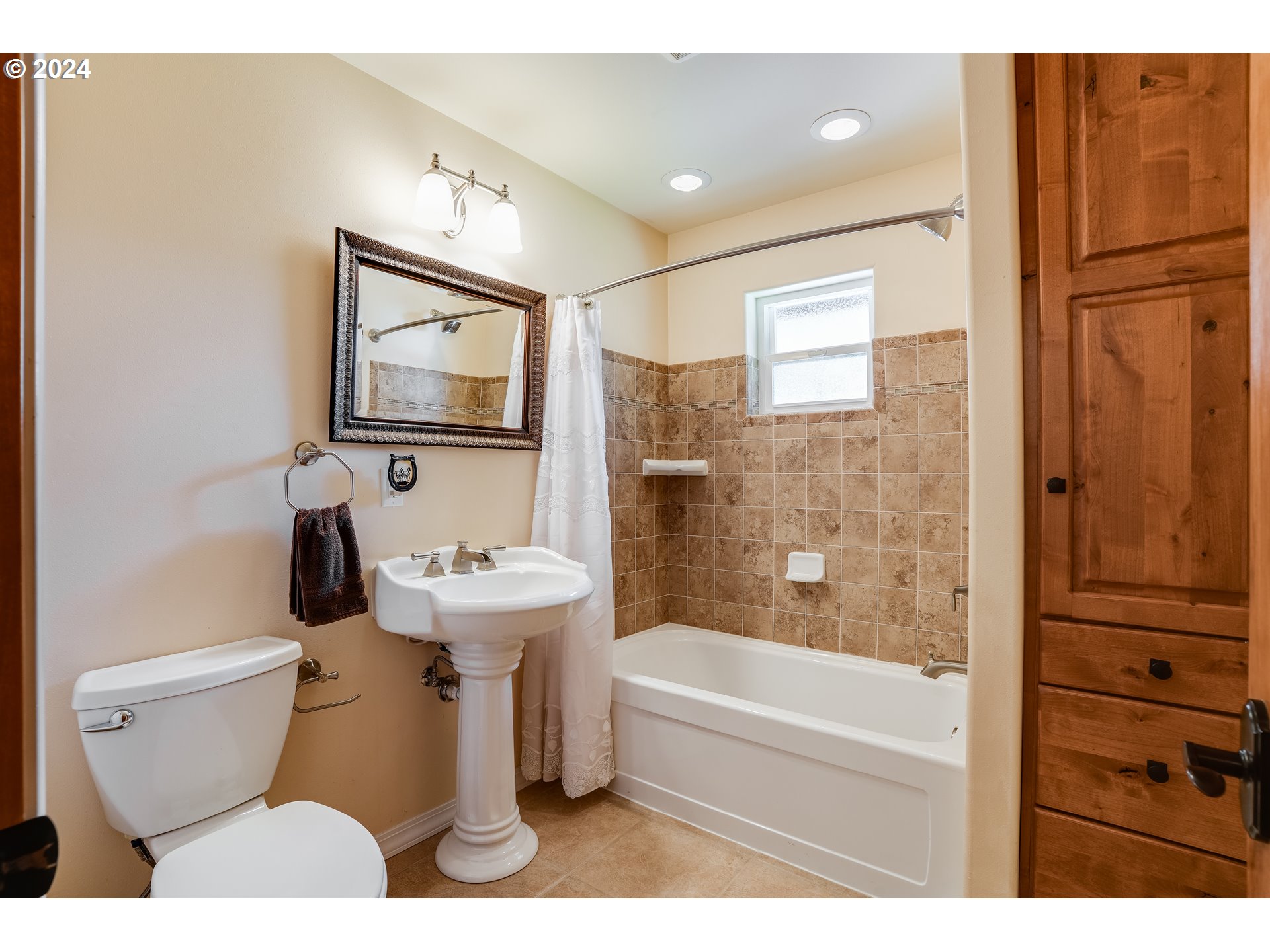 11 Deer Ridge Road Goldendale, WA 98620 - Photo 16 of 45 a bathroom with a sink a toilet and shower