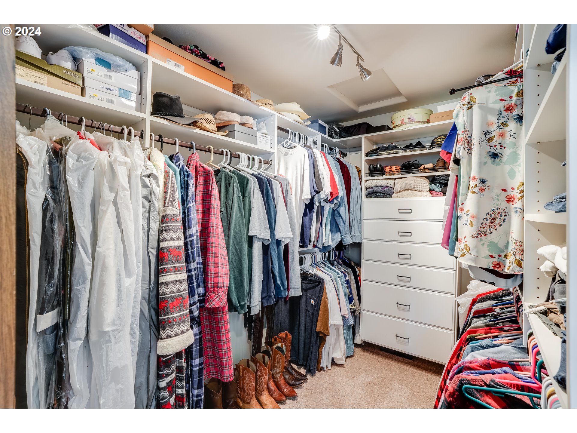 11 Deer Ridge Road Goldendale, WA 98620 - Photo 30 of 45 a view of walk in closet with clothes and shoes