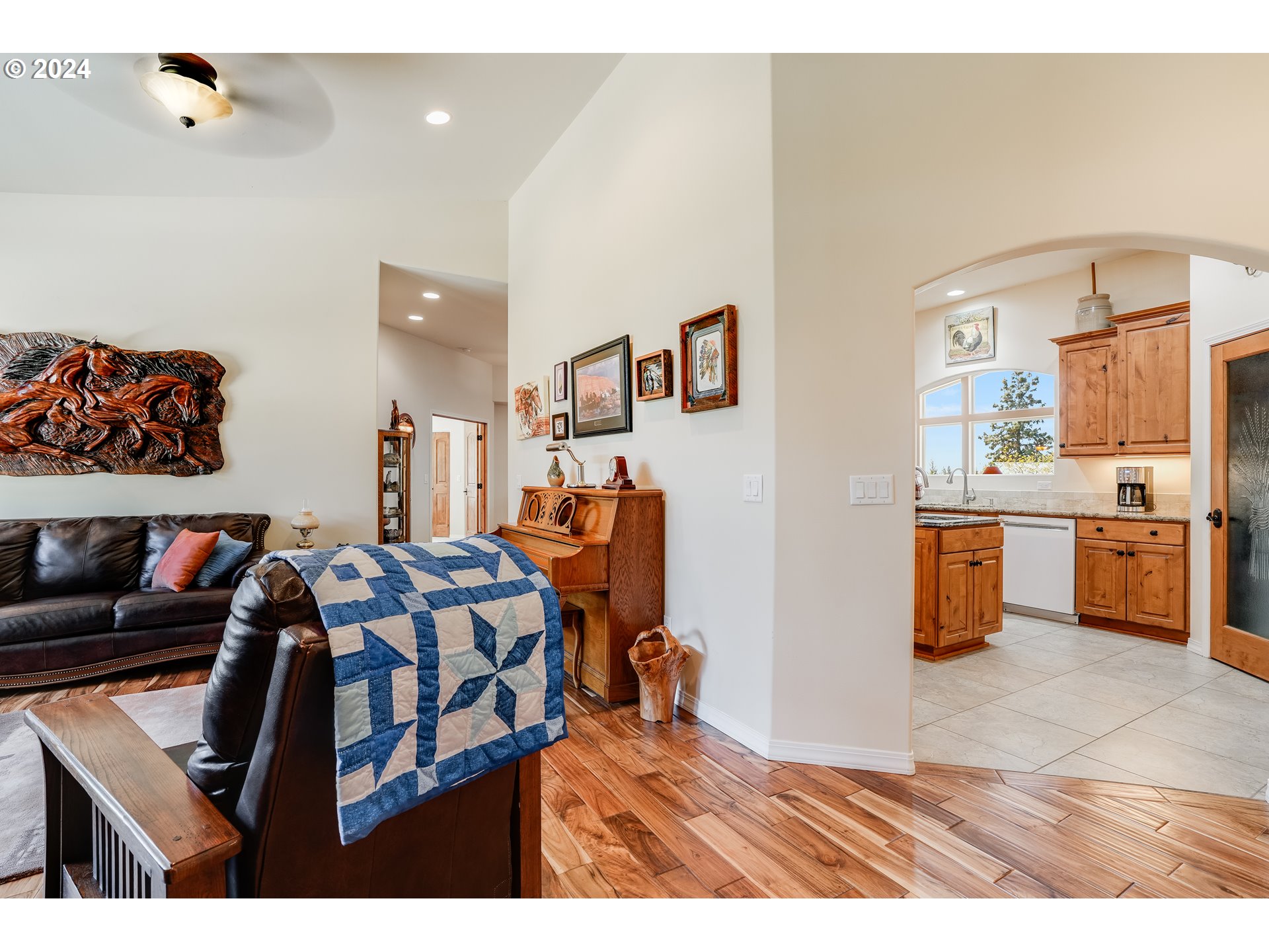 11 Deer Ridge Road Goldendale, WA 98620 - Photo 5 of 45 a bedroom with a bed and glass table