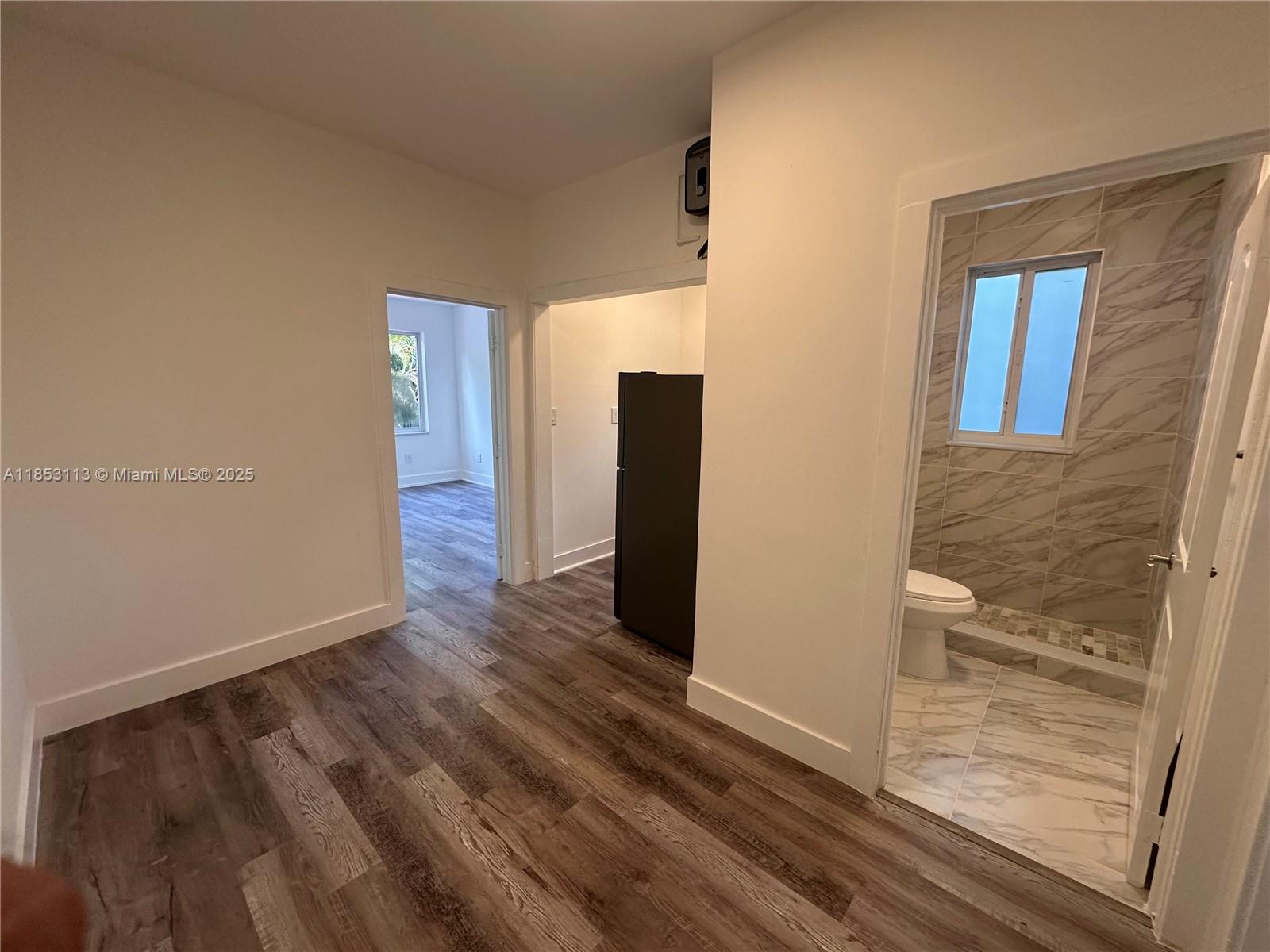 1630 Southwest 10th Street, Unit 8 Miami, FL 33135 - Photo 8 of 14 wooden floor in an empty room