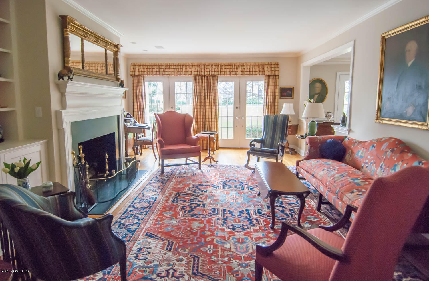 4 Old Church Road, Unit 6 Greenwich, CT 06830 - Photo 4 of 19 a living room with furniture fireplace and flat screen tv