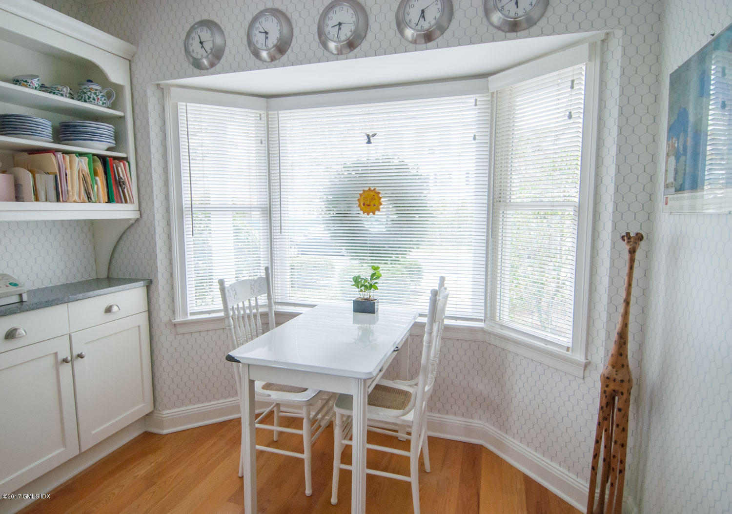 4 Old Church Road, Unit 6 Greenwich, CT 06830 - Photo 9 of 19 a view of a dining room with furniture and window