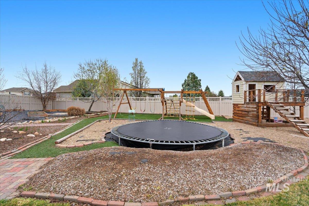 1282 Cimarron Court Middleton, ID 83644 - Photo 34 of 44 Fenced backyard featuring a trampoline