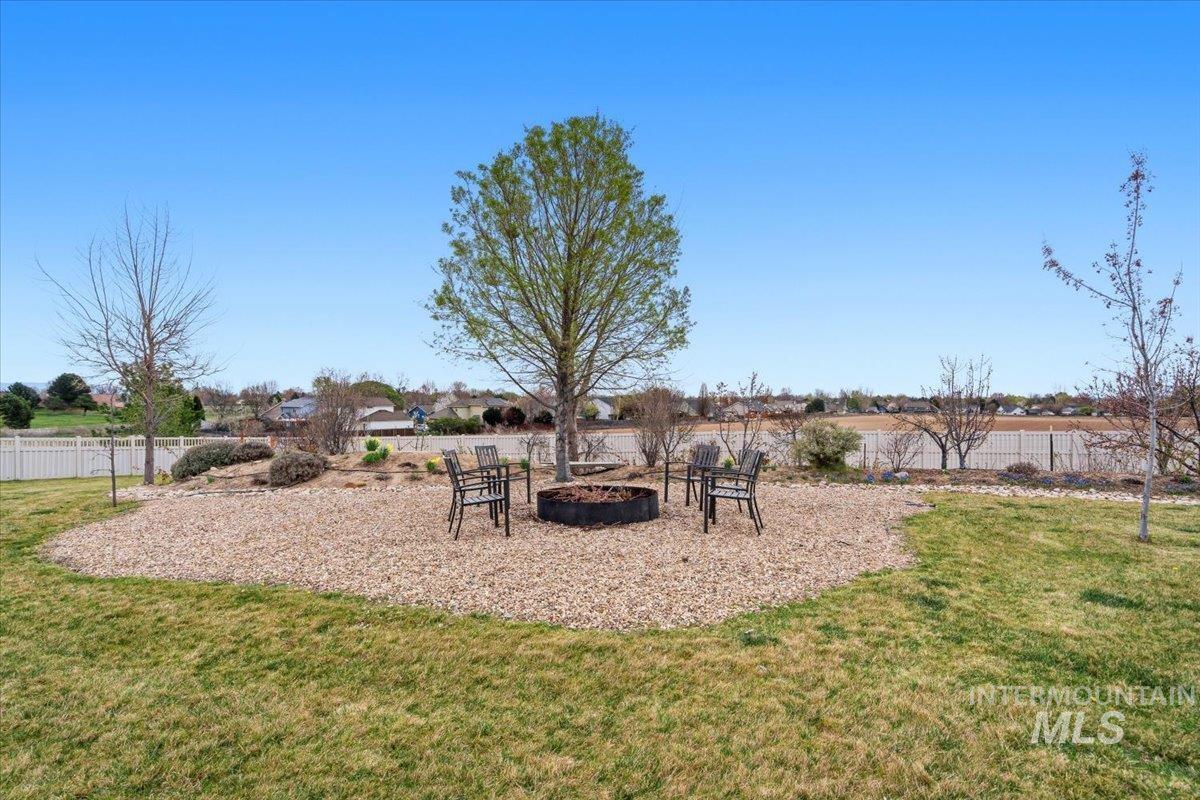 1282 Cimarron Court Middleton, ID 83644 - Photo 36 of 44 View of yard with a fire pit