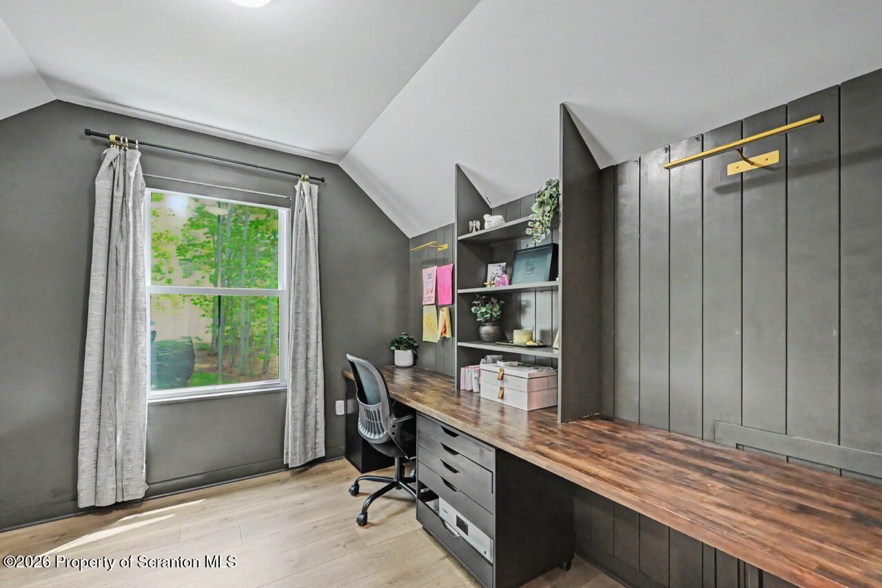 100 Highland Road Moscow, PA 18444 - Photo 48 of 85 a view of a workspace with furniture and a window