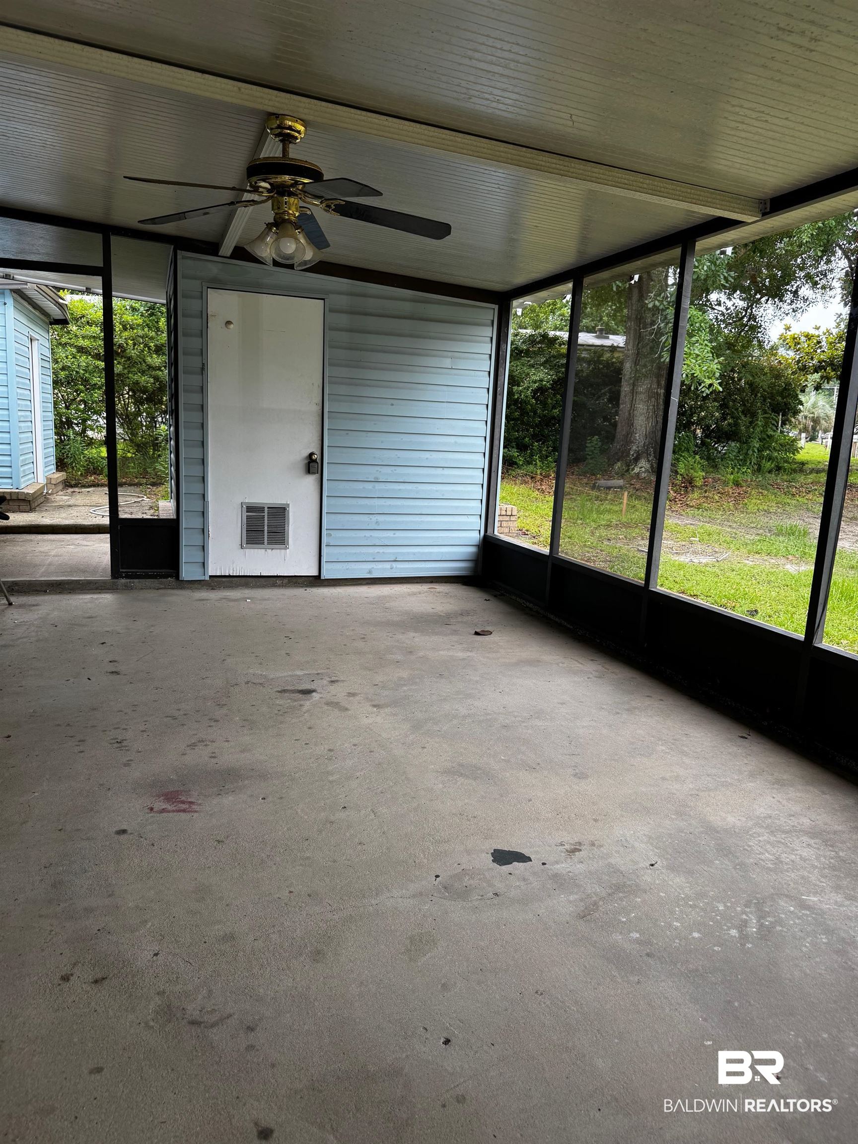 24994 Pompano Drive Elberta, AL 36530 - Photo 13 of 14 Unfurnished sunroom with a ceiling fan and healthy amount of natural light
