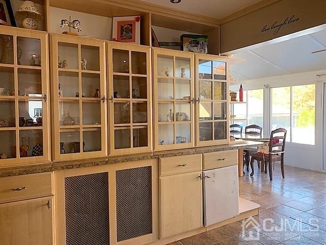 730 Center Street Dunellen, NJ 08812 - Photo 11 of 27 a view of a workspace with furniture and a window