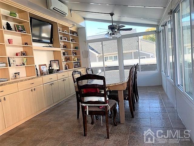 730 Center Street Dunellen, NJ 08812 - Photo 14 of 27 a view of a dining room with furniture and a window