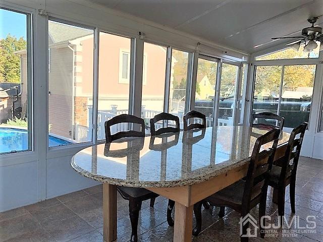 730 Center Street Dunellen, NJ 08812 - Photo 15 of 27 a view of a dining room with furniture and window