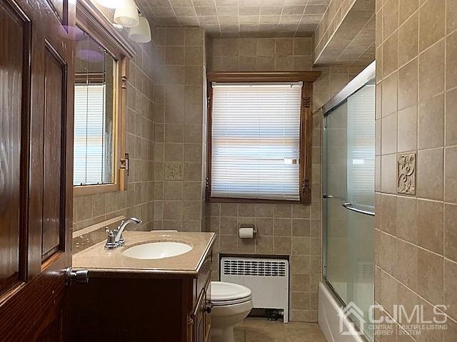 730 Center Street Dunellen, NJ 08812 - Photo 17 of 27 a bathroom with a sink toilet and shower