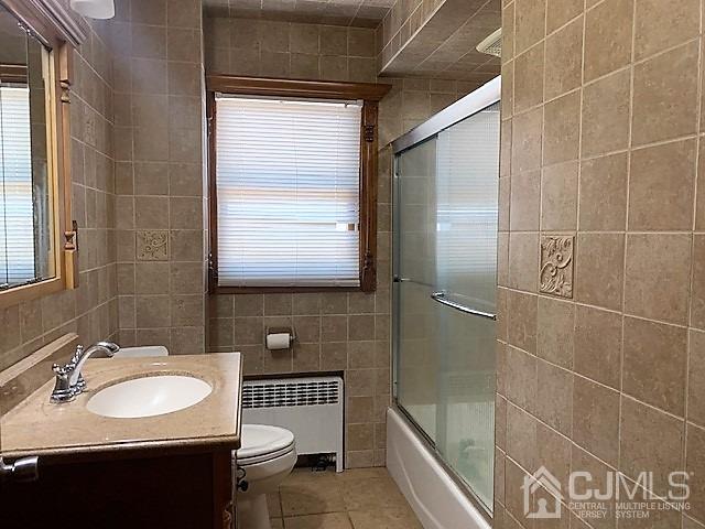 730 Center Street Dunellen, NJ 08812 - Photo 18 of 27 a bathroom with a sink toilet and shower