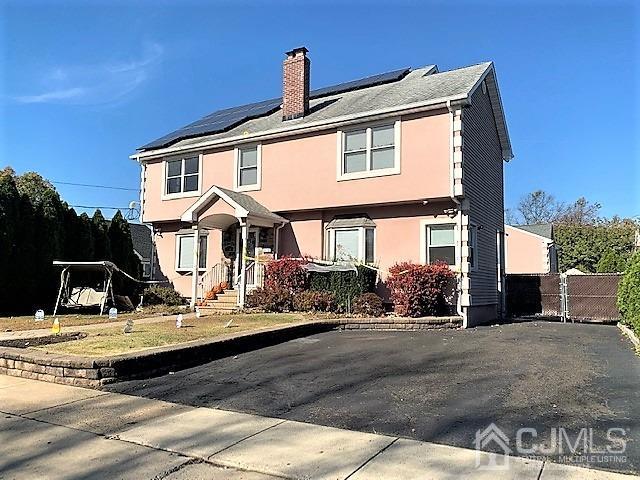 730 Center Street Dunellen, NJ 08812 - Photo 3 of 27 a front view of a house with entertaining space
