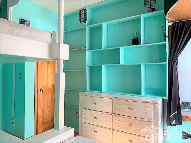 730 Center Street Dunellen, NJ 08812 - Photo 22 of 27 a bathroom with a shower and a mirror