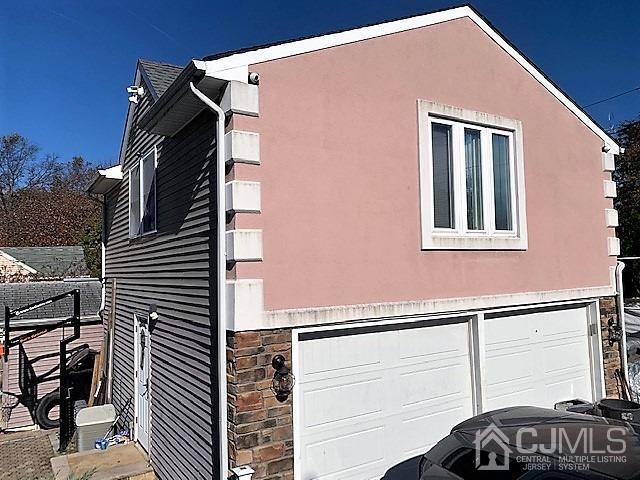 730 Center Street Dunellen, NJ 08812 - Photo 25 of 27 a front view of a house