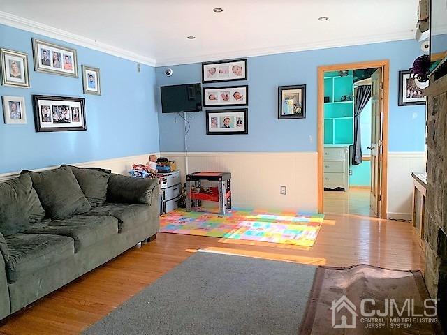 730 Center Street Dunellen, NJ 08812 - Photo 7 of 27 a living room with furniture and a couch