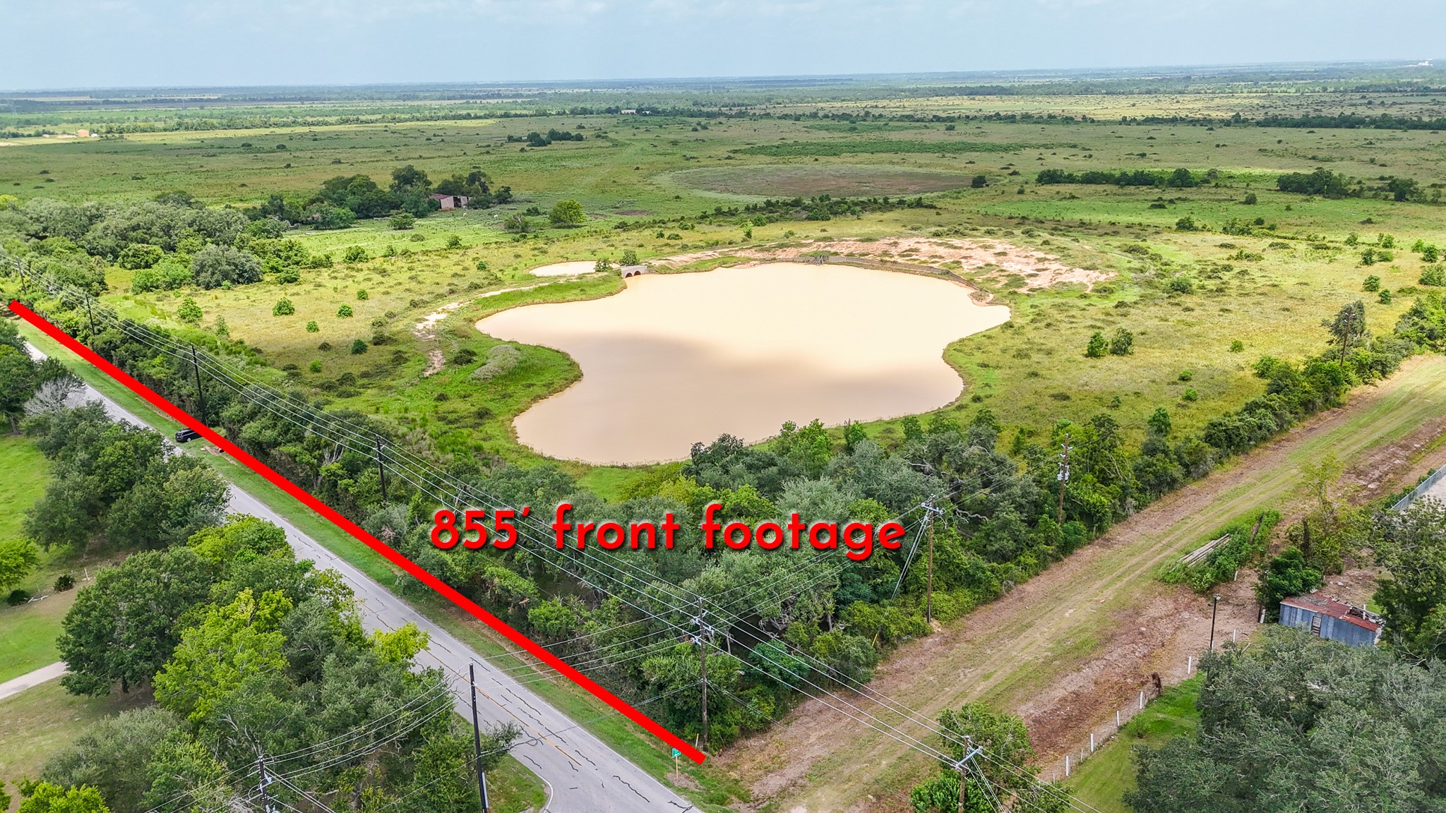 9009 Katy Hockley Road Katy, TX 77493 - Photo 2 of 14 a view of a lake with a big yard