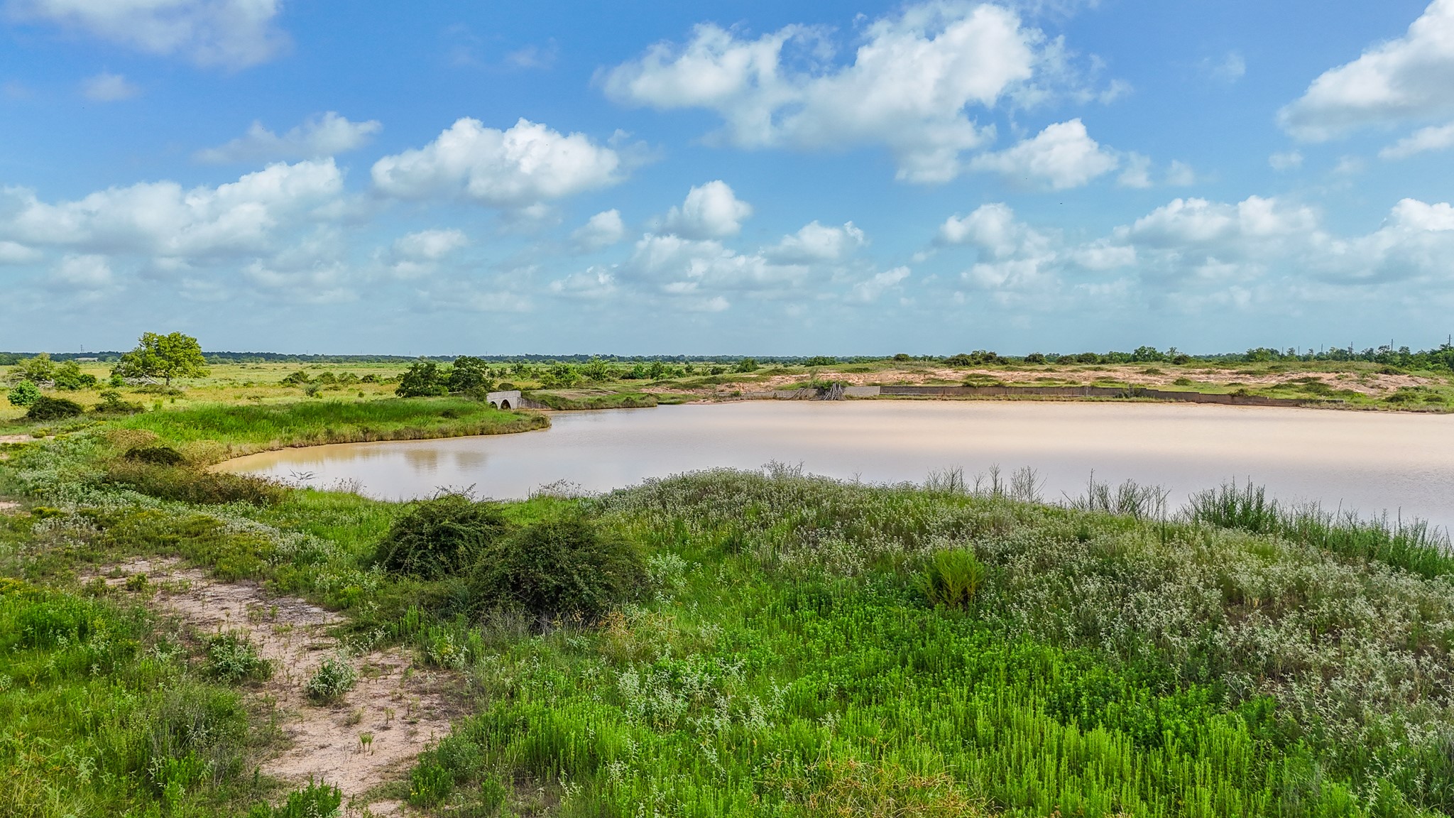 9009 Katy Hockley Road Katy, TX 77493 - Photo 8 of 14 a view of a lake with houses in the back