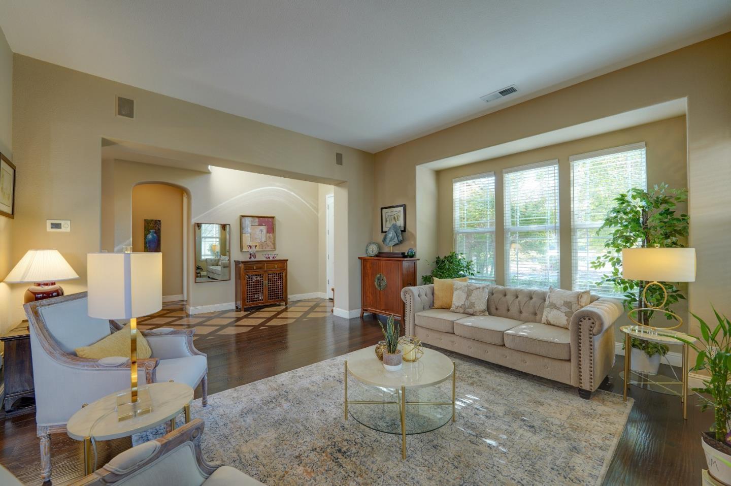 2400 Club Drive Gilroy, CA 95020 - Photo 13 of 67 a living room with furniture and a large window