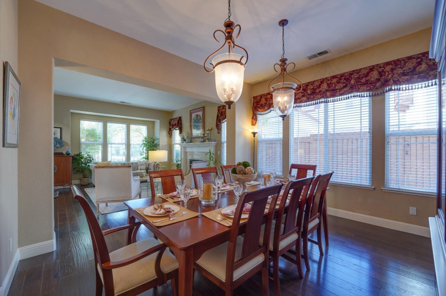 2400 Club Drive Gilroy, CA 95020 - Photo 15 of 67 a view of a dining room with furniture window and wooden floor