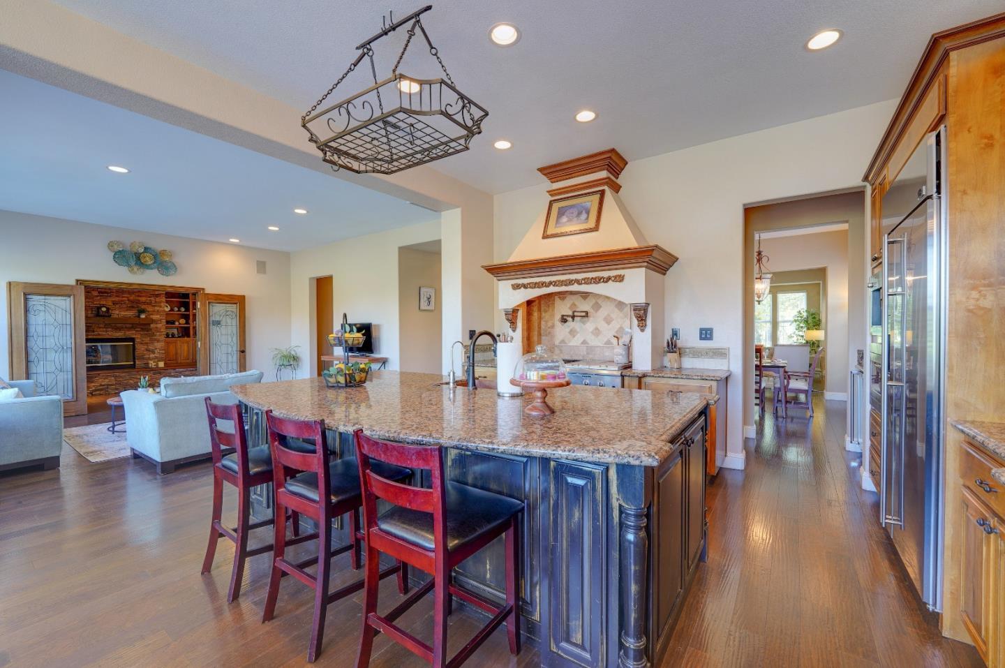 2400 Club Drive Gilroy, CA 95020 - Photo 19 of 67 a view of a dining room with furniture window and wooden floor