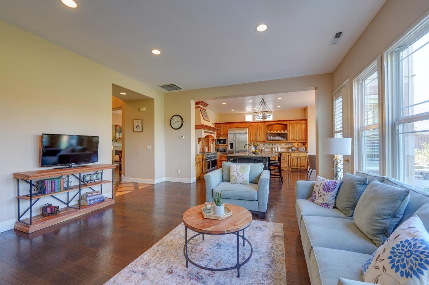 2400 Club Drive Gilroy, CA 95020 - Photo 25 of 67 a living room with furniture and a flat screen tv