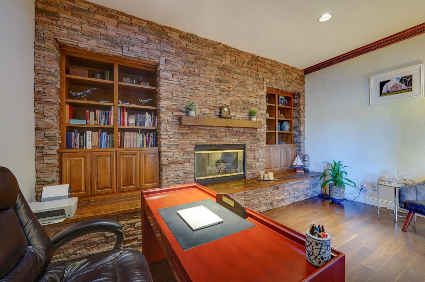 2400 Club Drive Gilroy, CA 95020 - Photo 27 of 67 a living room with furniture pool table and a fireplace