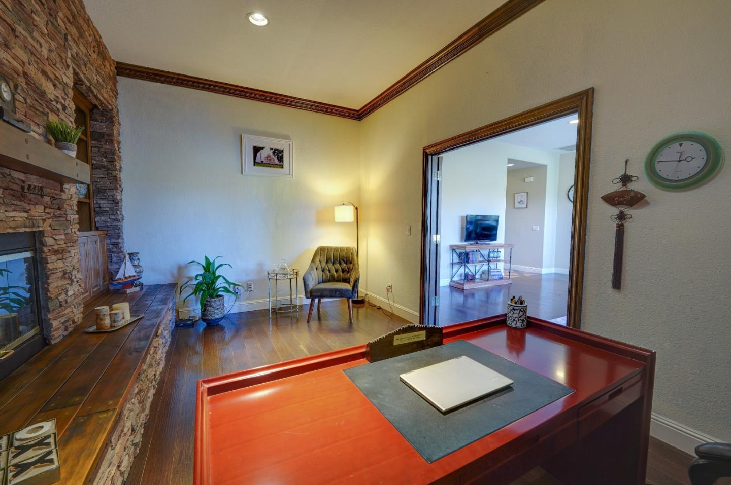 2400 Club Drive Gilroy, CA 95020 - Photo 28 of 67 a living room with furniture and a fireplace