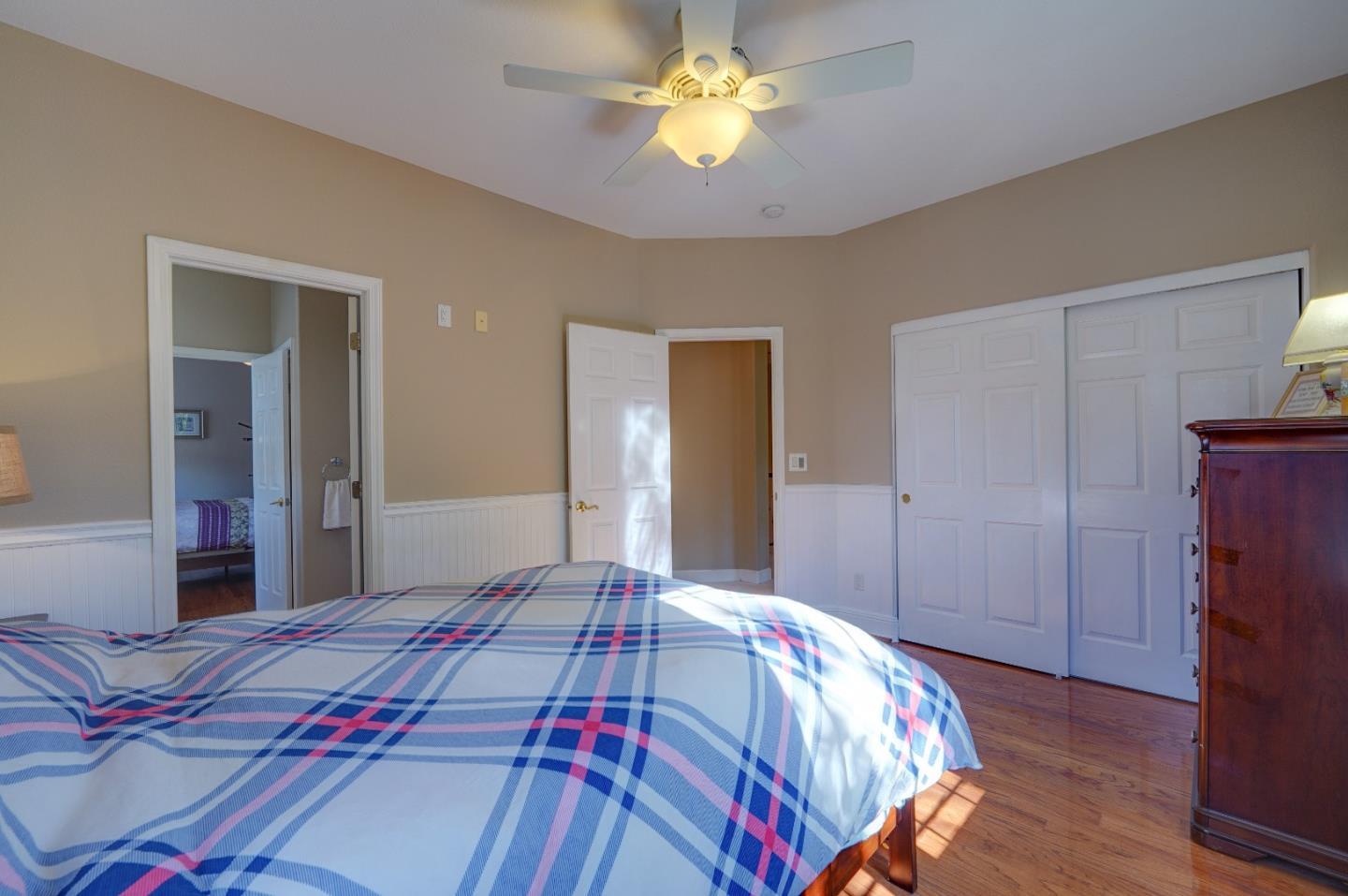 2400 Club Drive Gilroy, CA 95020 - Photo 40 of 67 a bedroom with a bed and a chandelier