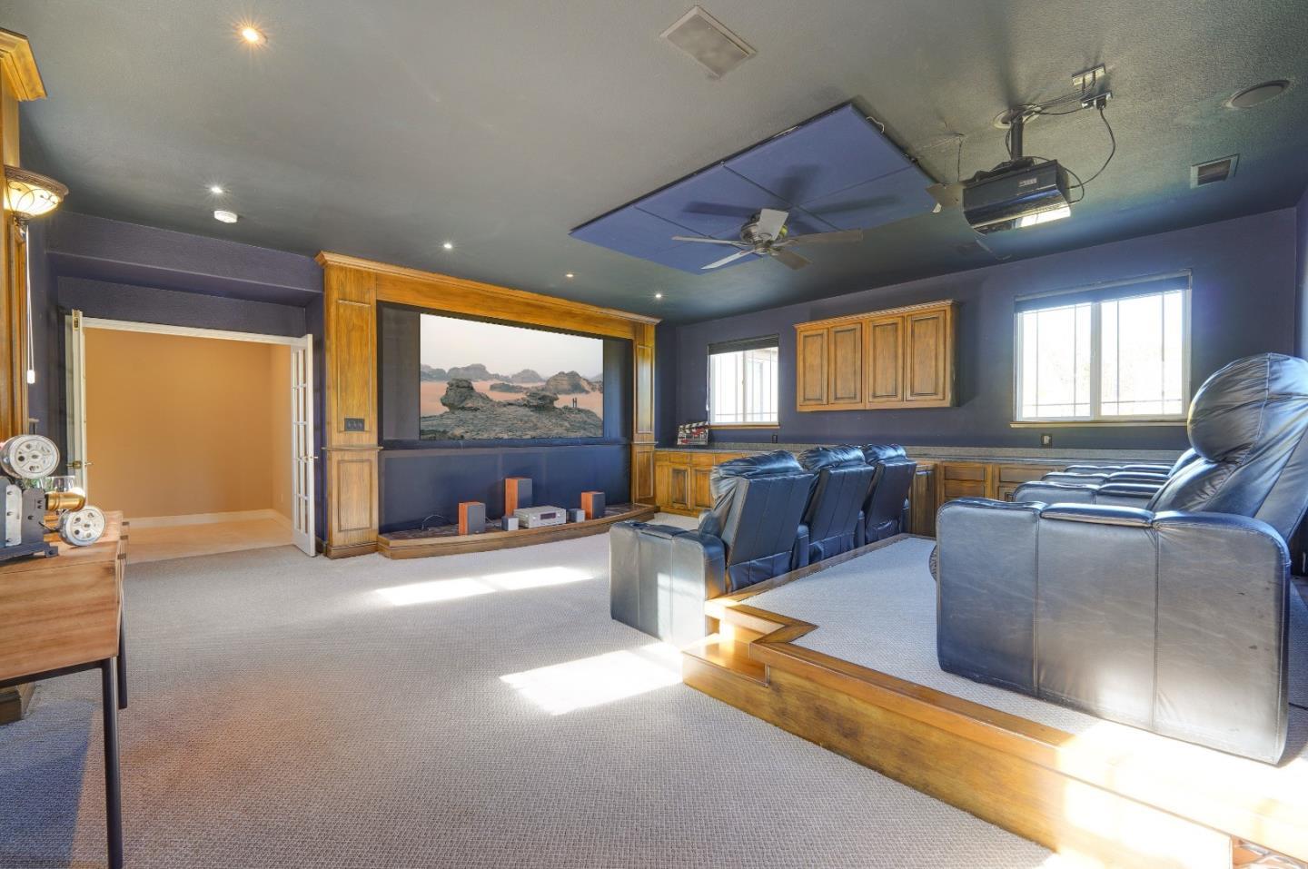 2400 Club Drive Gilroy, CA 95020 - Photo 45 of 67 a living room with furniture and a flat screen tv