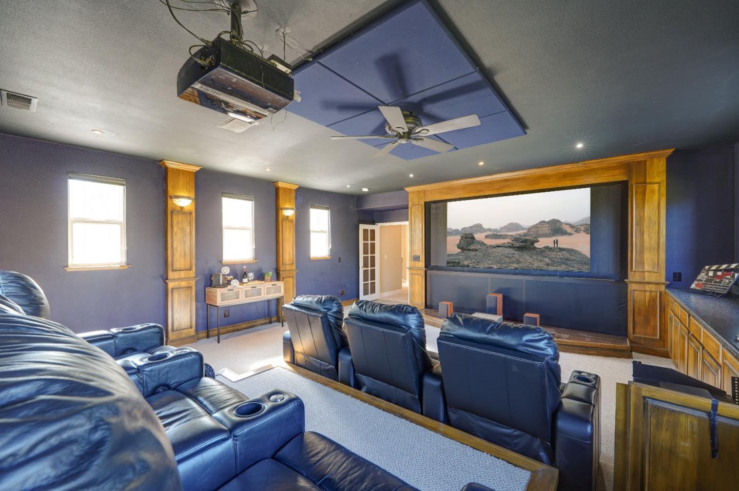 2400 Club Drive Gilroy, CA 95020 - Photo 46 of 67 a living room with furniture and a flat screen tv