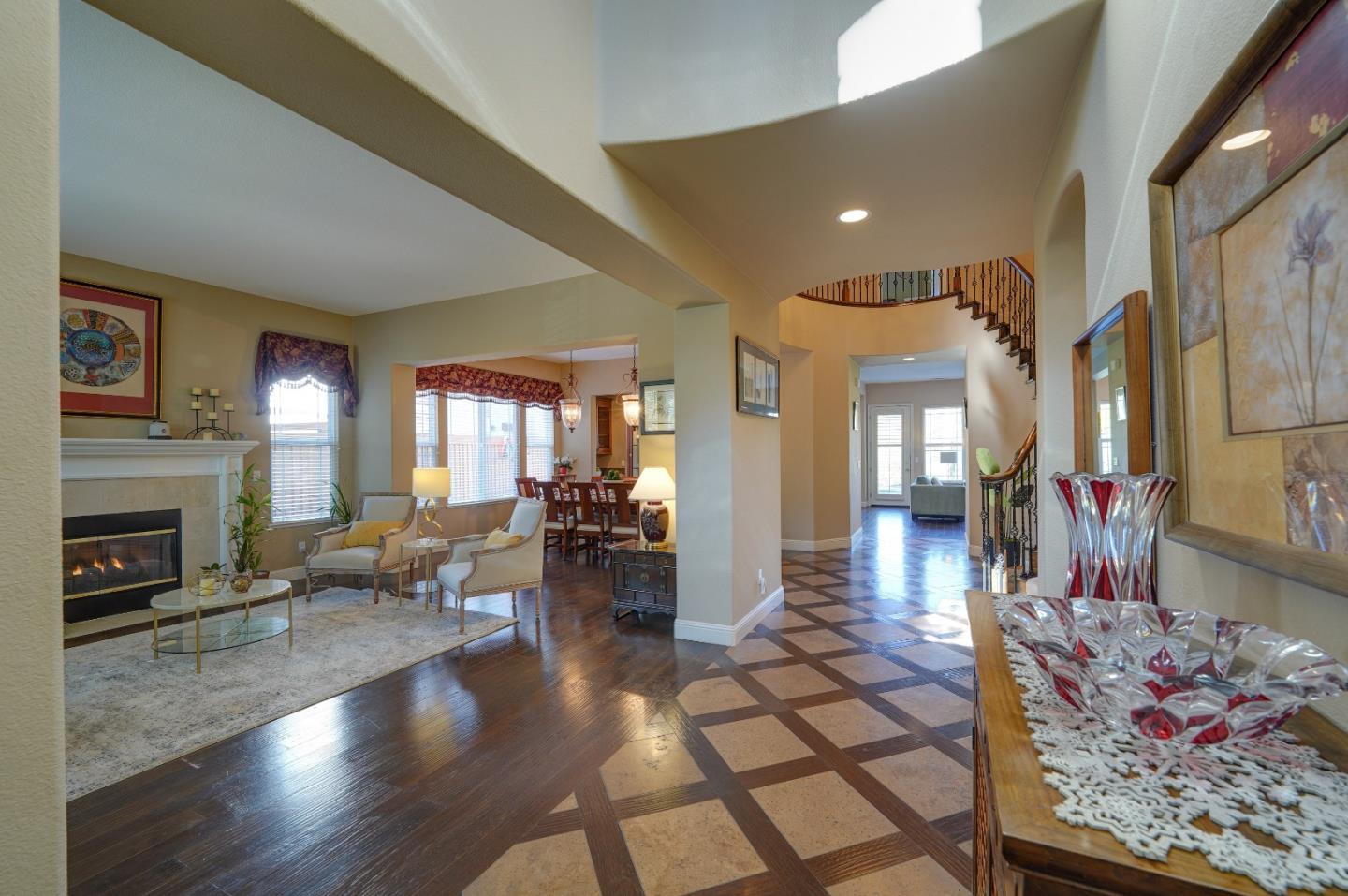 2400 Club Drive Gilroy, CA 95020 - Photo 8 of 67 a living room with fireplace furniture and a fireplace