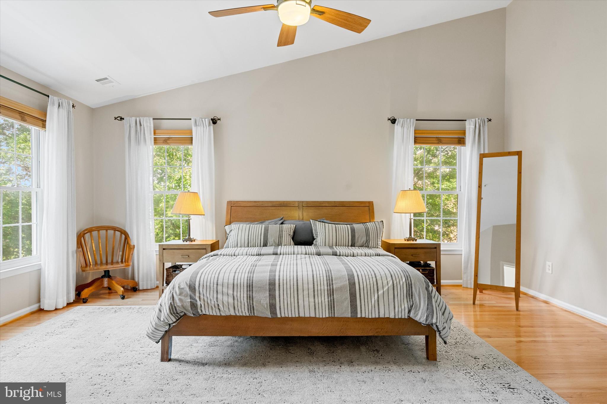 8512 Bells Ridge Terrace Potomac, MD 20854 - Photo 19 of 45 a bedroom with a bed chair and a window