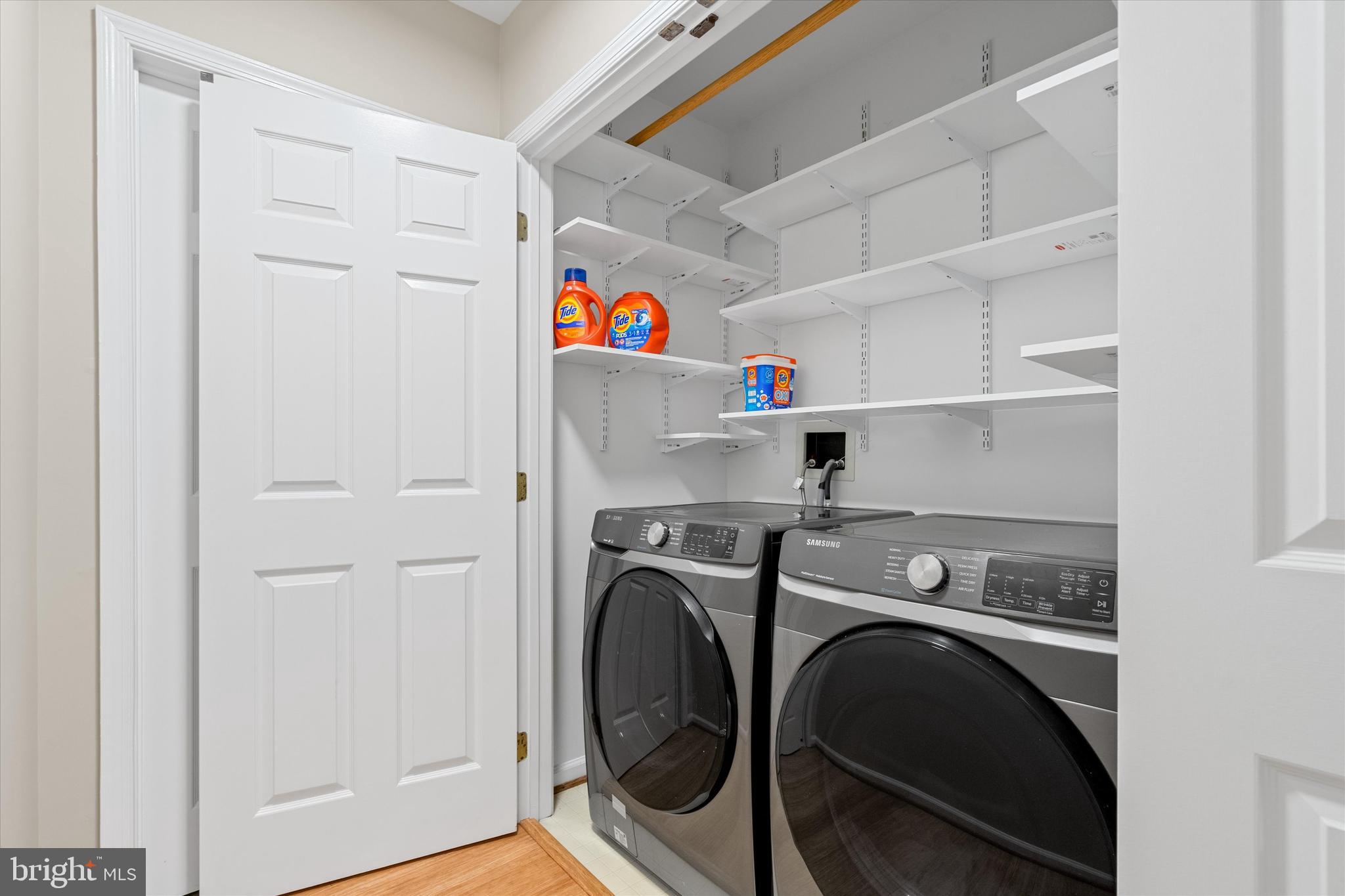 8512 Bells Ridge Terrace Potomac, MD 20854 - Photo 27 of 45 a utility room with dryer and washer