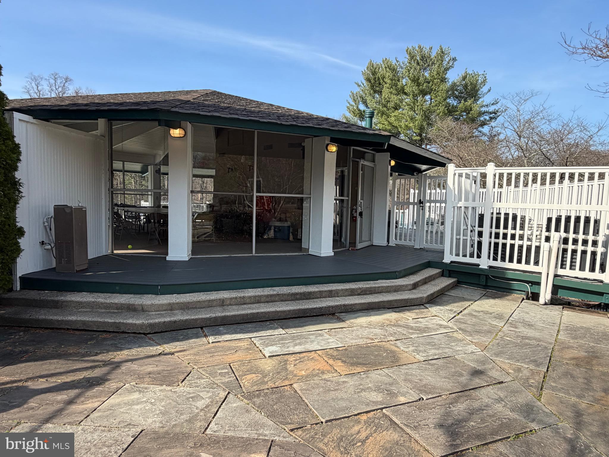 8512 Bells Ridge Terrace Potomac, MD 20854 - Photo 38 of 45 a view of a house with a small yard and a large window