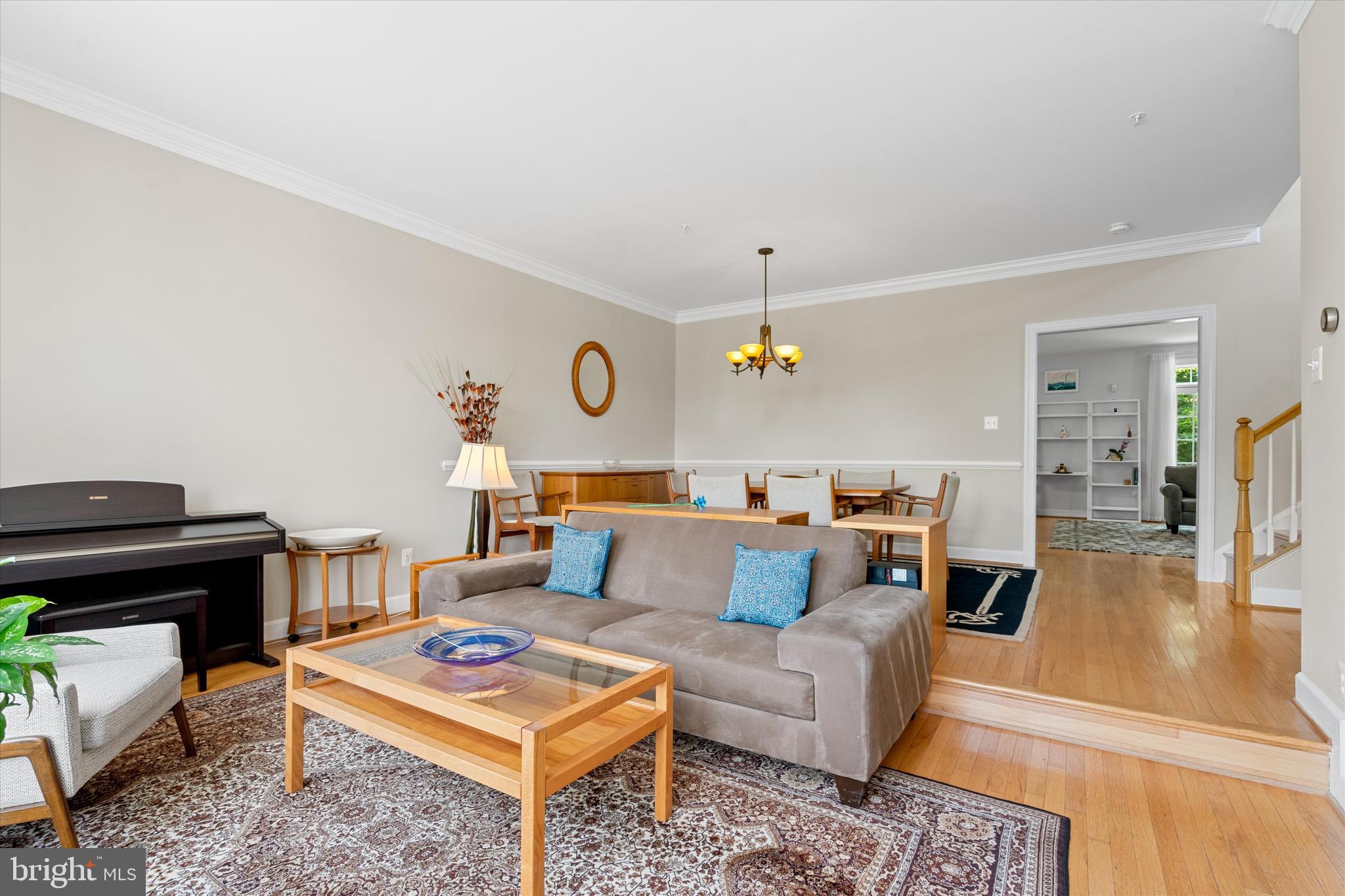 8512 Bells Ridge Terrace Potomac, MD 20854 - Photo 5 of 45 a living room with furniture and a piano