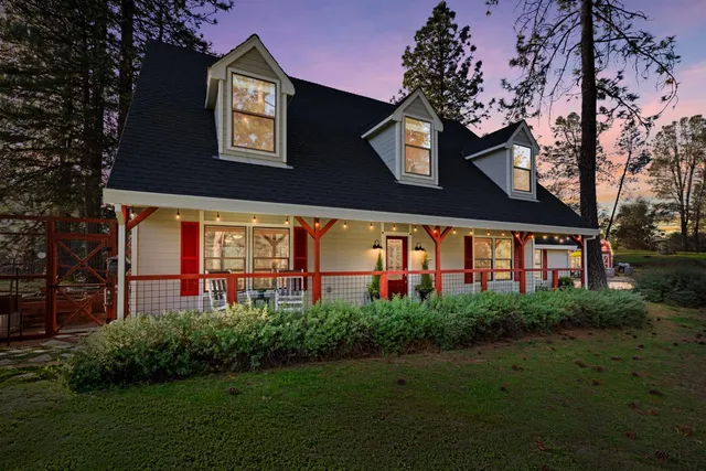 front view of a house with a small yard