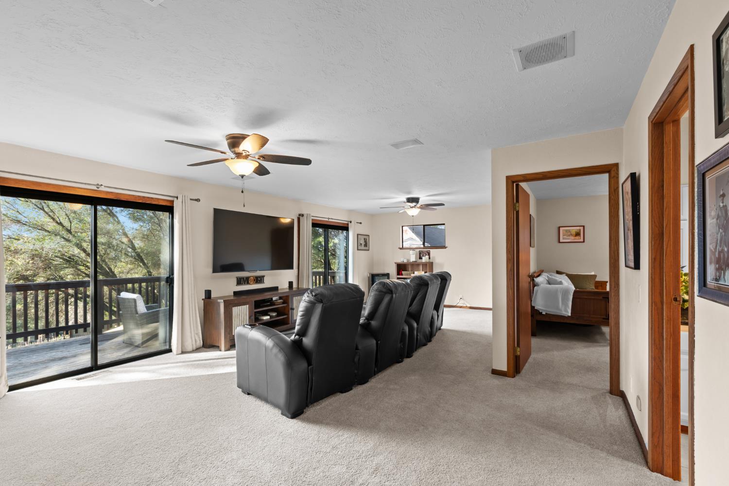17476 Fiddletown Road Fiddletown, CA 95629 - Photo 25 of 82 a living room with furniture and a flat screen tv