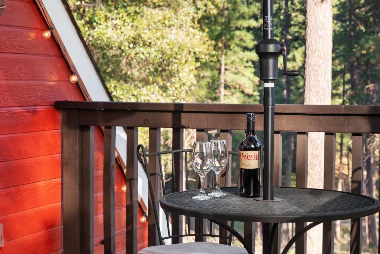 17476 Fiddletown Road Fiddletown, CA 95629 - Photo 51 of 82 a view of a balcony with furniture and wooden floor