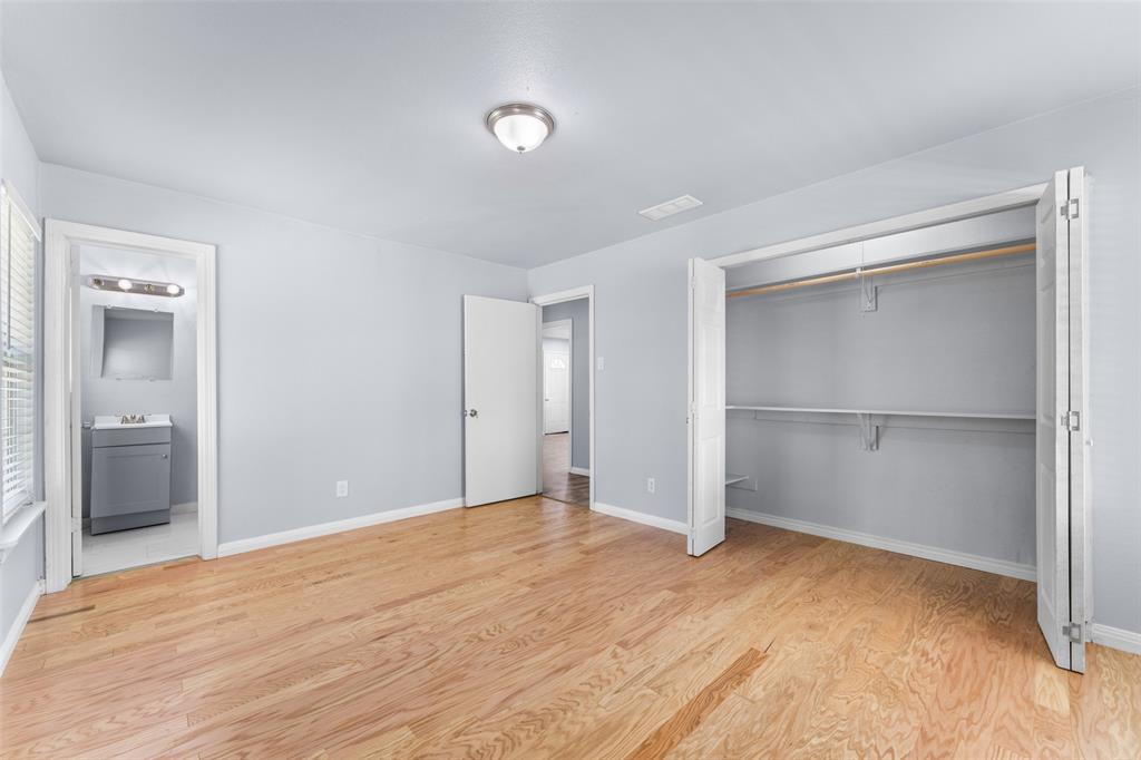 612 East 8th Street Kemp, TX 75143 - Photo 11 of 27 a view of an empty room and closet area