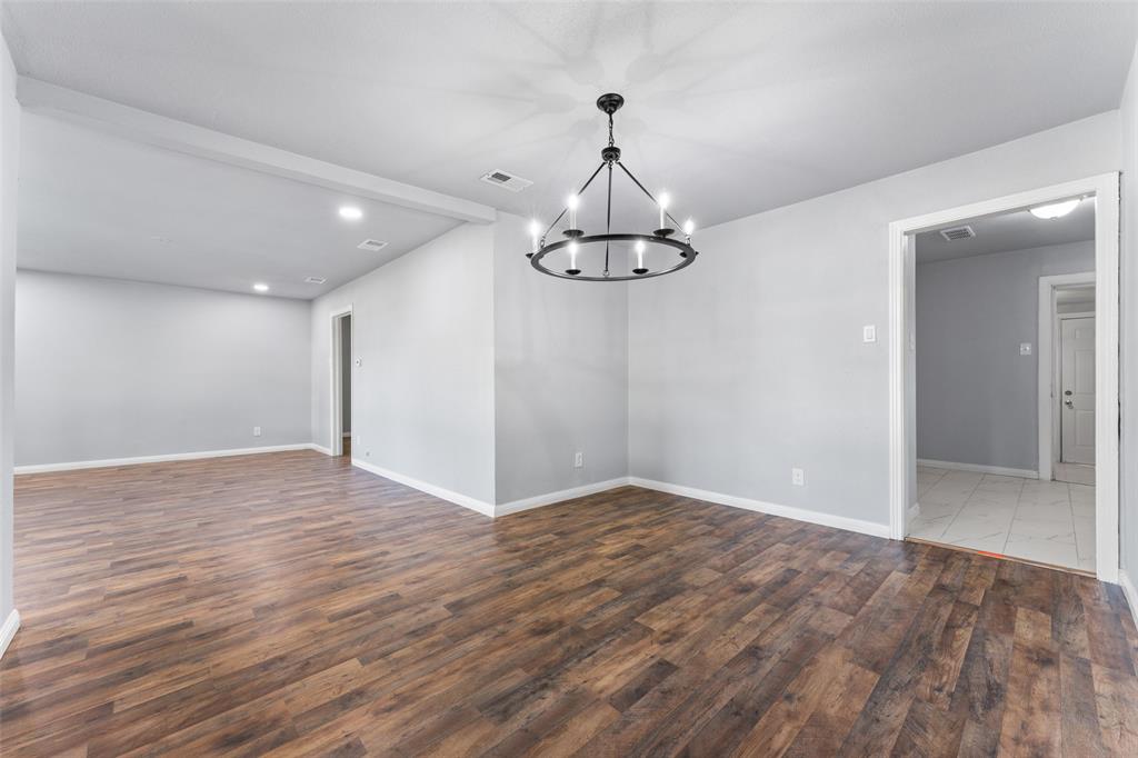 612 East 8th Street Kemp, TX 75143 - Photo 3 of 27 a view of empty room with wooden floor