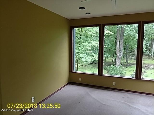 263 Canterbury Road Bushkill, PA 18324 - Photo 13 of 16 an empty room with a window