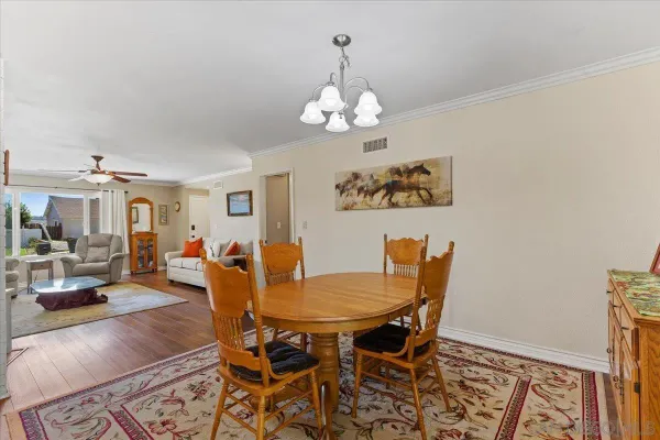 a view of a dining room with furniture