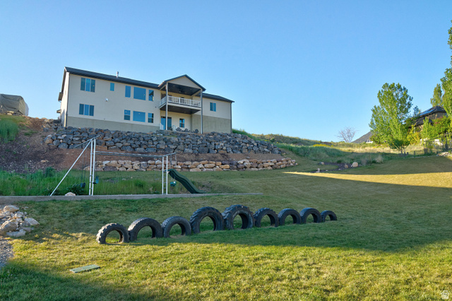 851 Grandview Drive Morgan, UT 84050 - Photo 58 of 68 Expansive lawn area with a terraced rock retaining wall