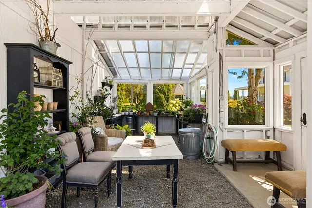 a outdoor space with lots of furniture and a potted plant