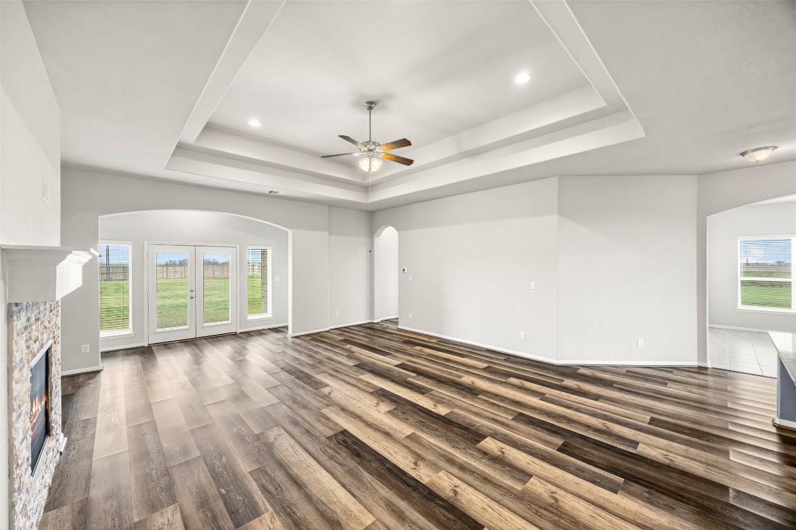 11202 Seguin Trail Needville, TX 77461 - Photo 13 of 31 a view of an empty room with wooden floor and a window