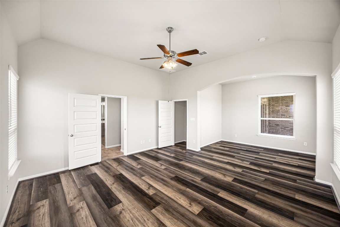 11202 Seguin Trail Needville, TX 77461 - Photo 14 of 31 a bedroom with a bed and a window