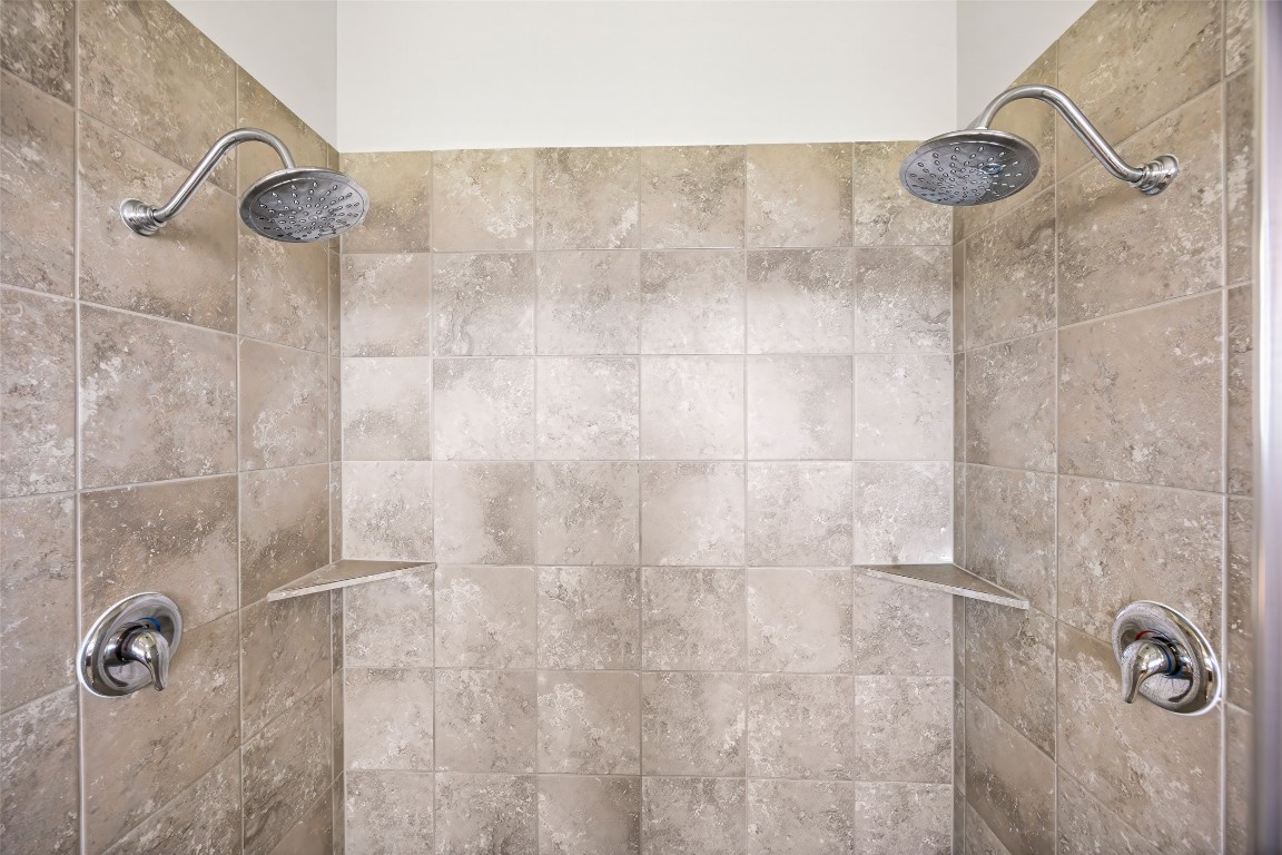 11202 Seguin Trail Needville, TX 77461 - Photo 16 of 31 a bathroom with a shower