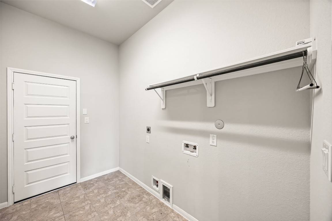 11202 Seguin Trail Needville, TX 77461 - Photo 24 of 31 a view of walk in closet
