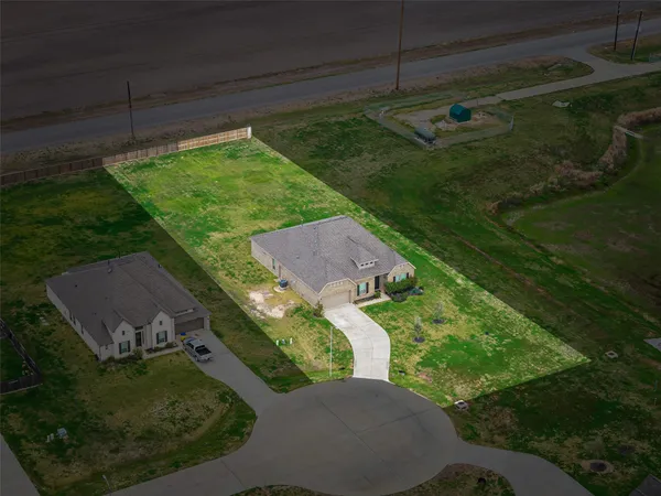 a view of a yard in front of a house