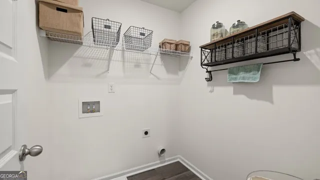 a view of staircase with white walls